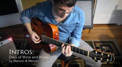 Matt playing his Sadowsky archtop in his office