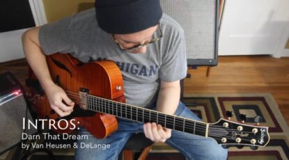 Matt playing his Sadowsky Archtop in his office